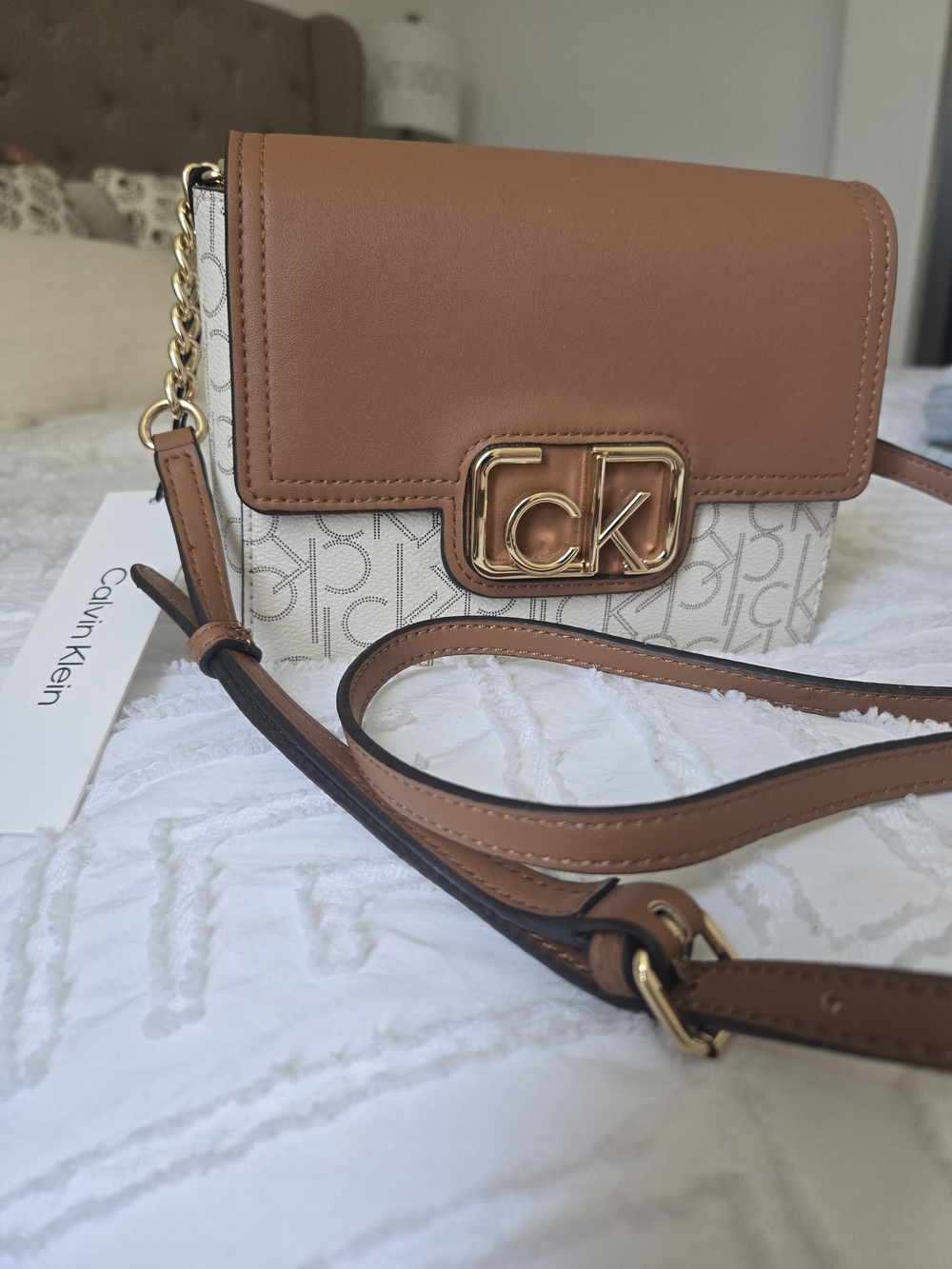 Calvin Klein Tan and Cream CK Monogram Crossbody Bag with Gold Hardware